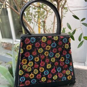 Caparros Black Mini Bag with Multicolor Floral Design